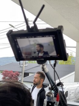 Behind camera Behind camera