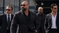 Mannlige statister med mafiautseende til reklamefilm