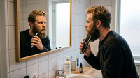 En man med långt skägg som vill raka sig!