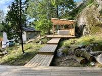 Sluttande skogstomt mot bergssida Sluttande skogstomt mot bergssida